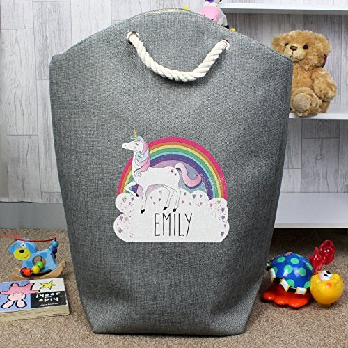 Personalised unicorn storage bag. Can be used as a laundry bag, or toy storage. Features a cute unicorn, rainbow and cloud design with a personalised name feature.