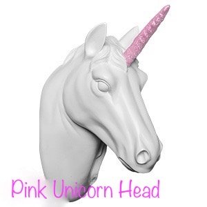 Wall mounted unicorn head white with a pink horn. Wall decor. Interior statement piece. Children's bedroom.