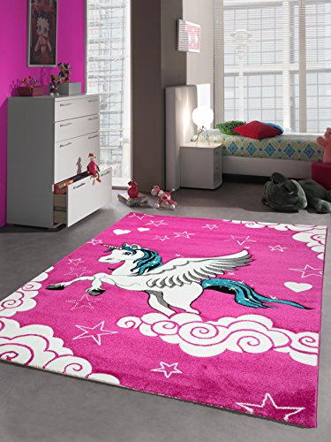 Girls pink unicorn themed rug for bedroom, would look perfect in a playroom or nursery. Unicorns clouds and stars!