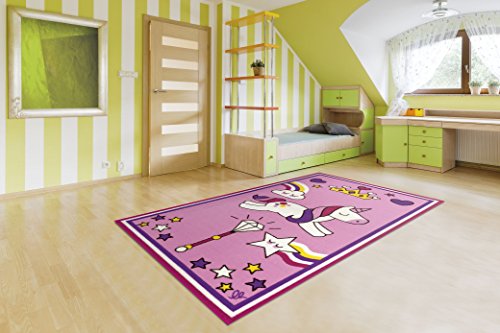 Fun pink unicorn rug featuring stars rainbows clouds and crowns! Perfect for kids playroom or bedroom