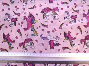 Cute Rainbow & Unicorns Printed Satin Fabric | Pink | 100% Polyester | 147cm wide. 